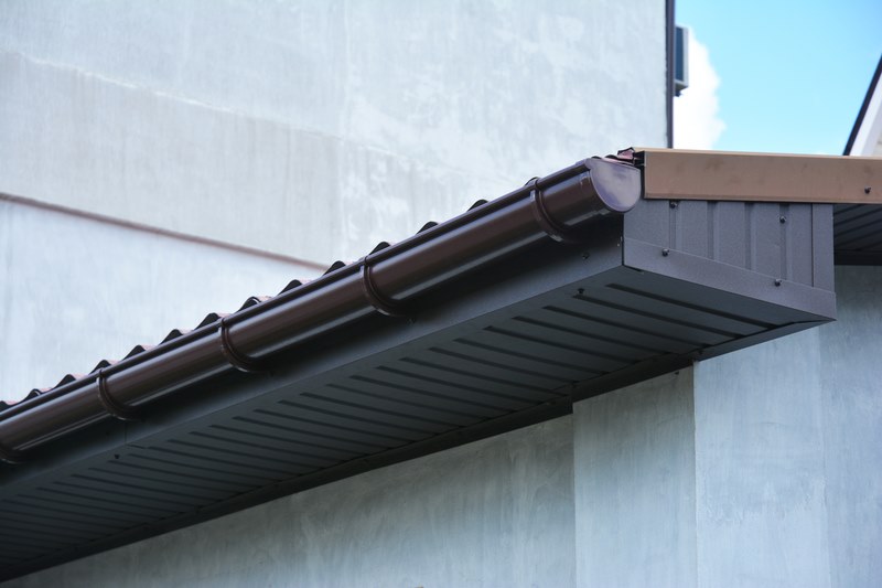 Close-up of PVC guttering installed on a house