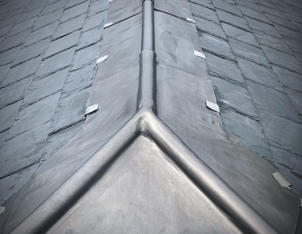 Close-up of dressed lead roofing work