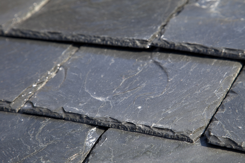 Natural slate tiles close-up on a roof